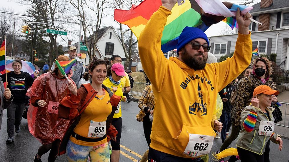 2022 Members of the Staten Island Irish-American LGBTQ community prepare to run the parade route before the start of the annual St Patricks Day Parade to protest their continued exclusion