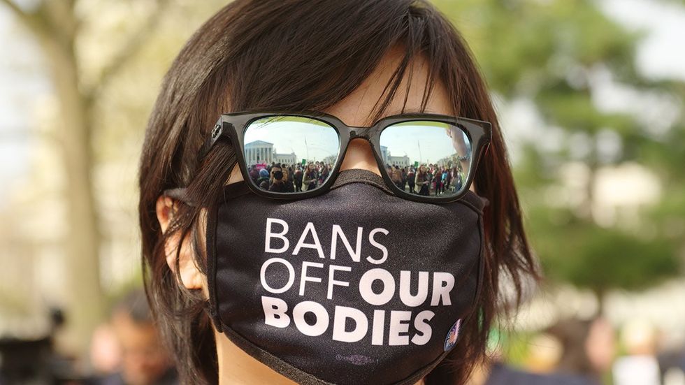 bans off our bodies mask at protest potential ban on the progesterone blocker mifepristone