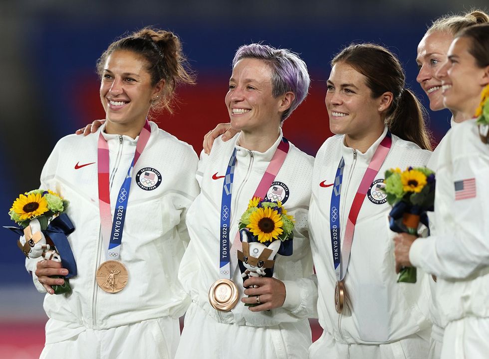 Bronze medalists Carli Lloyd Megan Rapinoe Kelley OHara with the United States team Bronze Medals Women's Soccer Football Competition Medal Ceremony