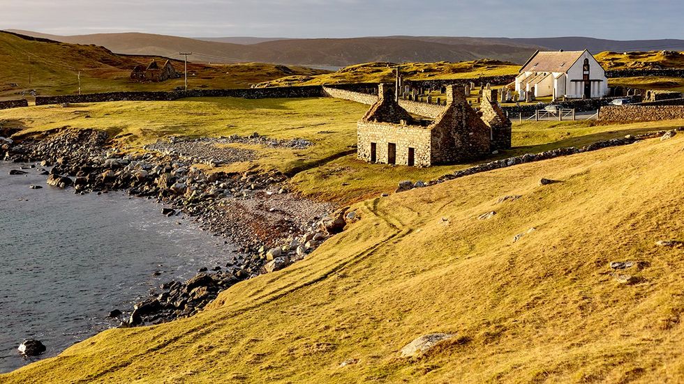 building and stone ruins scottish counrtyside shoreline