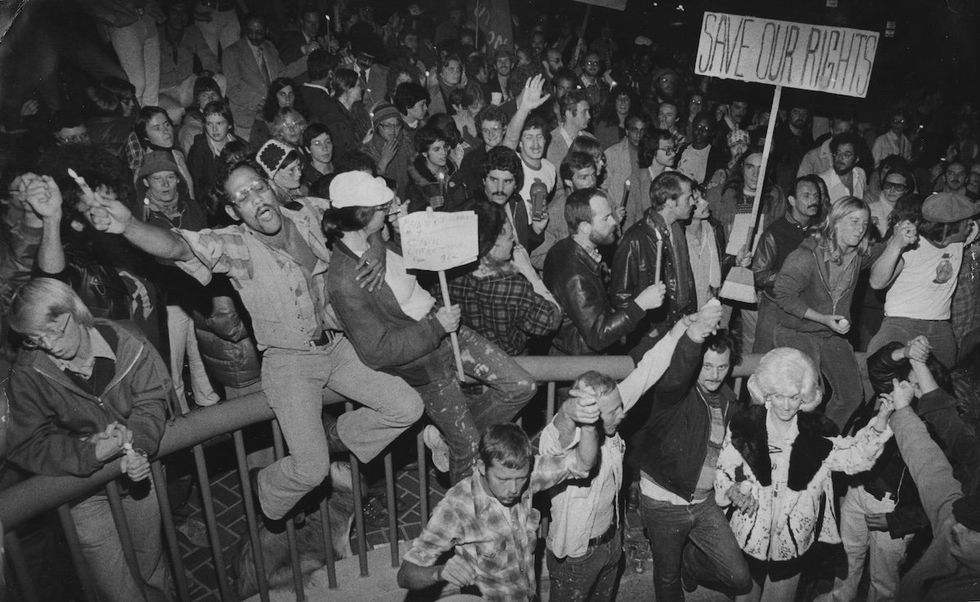 A celebration on San Francisco's Castro Street celebrates the defeat of the Miami referendum, an effort promoted by Save Our Children and Anita Bryant to overturn the ordinance banning discrimination against gays and lesbians. 1977/06/07 Gay Rights Project