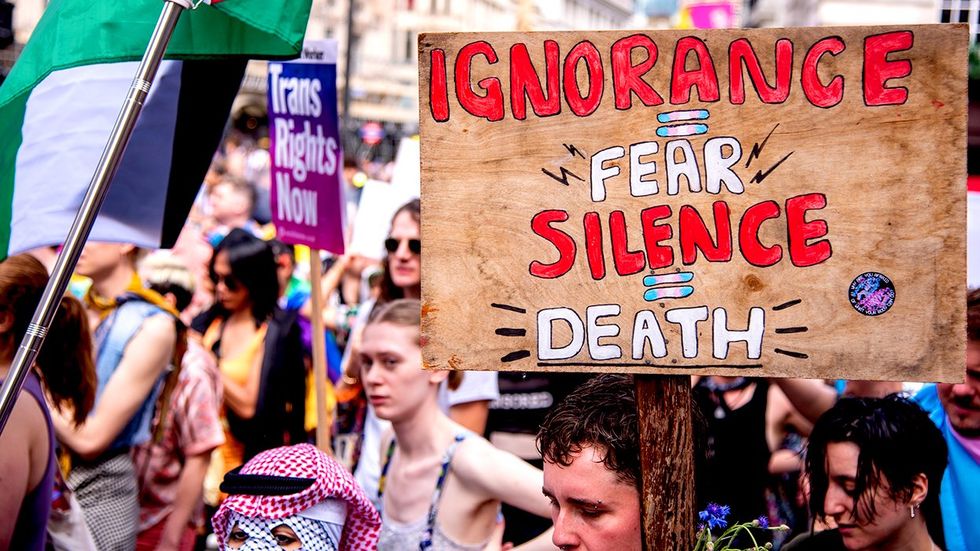 CEO Message LGBTQ Pride Parade signs silence equals death transgender rights