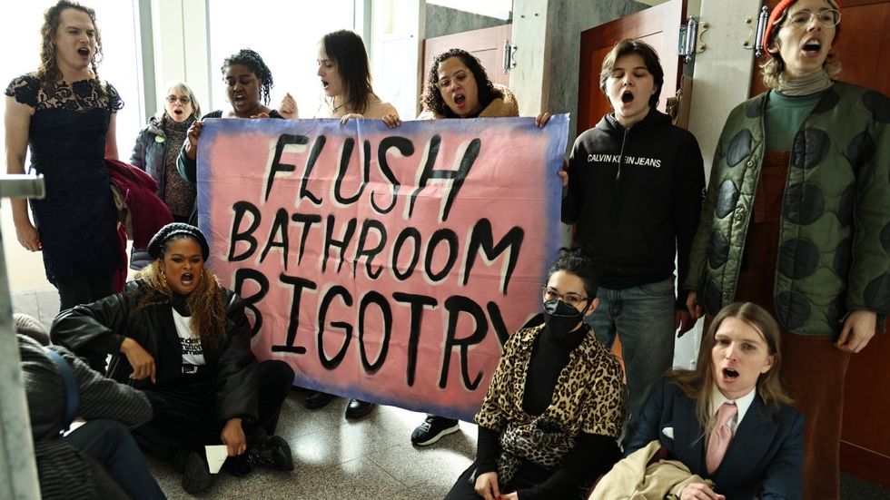 Chelsea Manning and Racquel Willis among 15 arrested at U.S. Capitol during bathroom sit-in