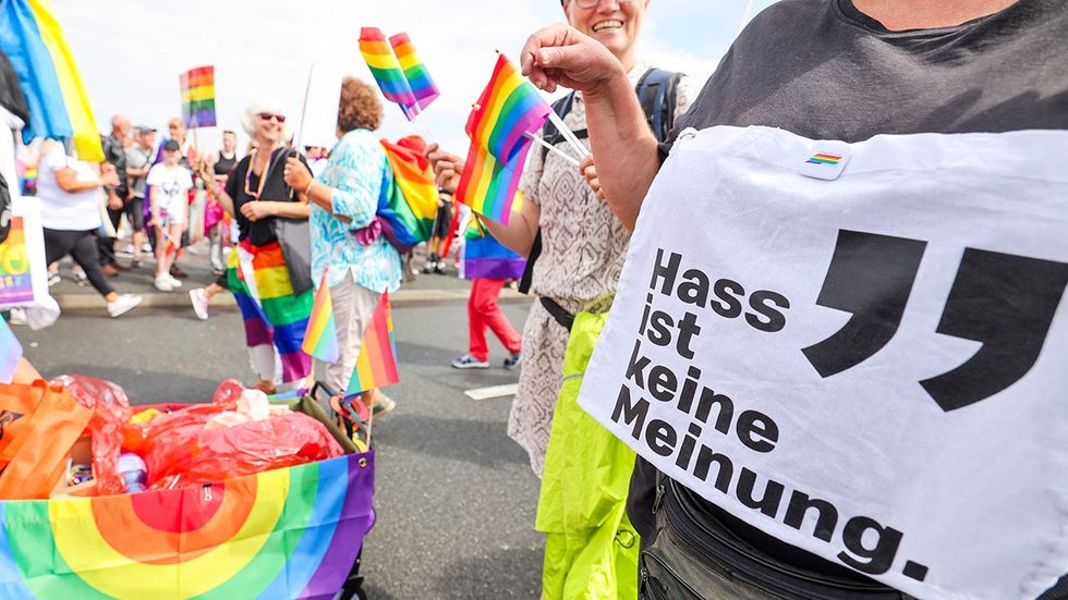 Cologne Germany North Rhine-Westphalia Christopher Street Day LGBTQ celebration hate is not an opinion shirt