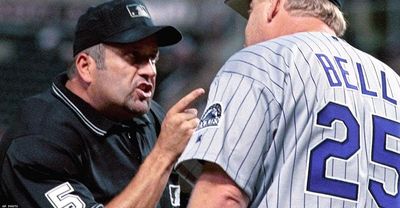 Retired umpire Dale Scott, who came out as gay in 2014, throws out