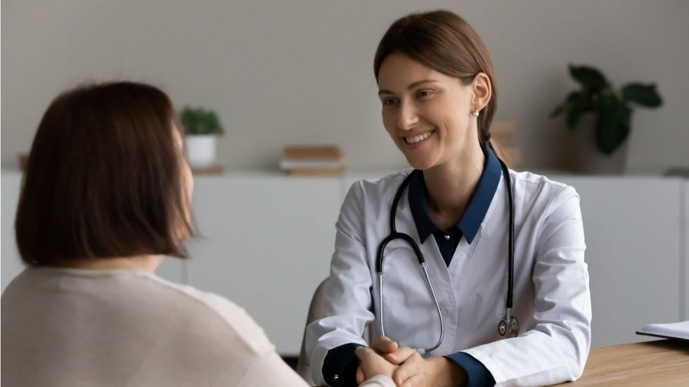 doctor speaking to patient 