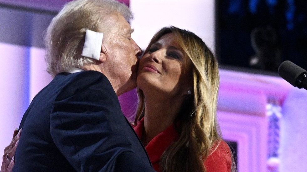 donald trump ear bandage kissing wife melania at RNC 2024