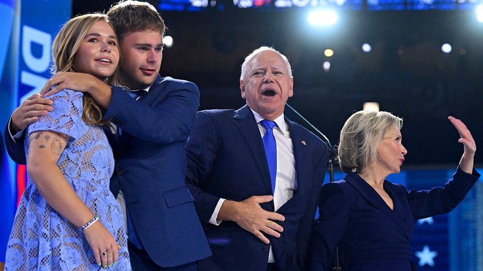 happy excited democratic political family on stage DNC 2024 kids Hope Gus Tim Walz wife Gwen