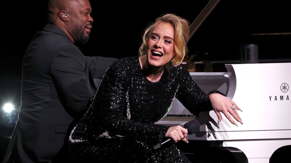 
Adele gives the perfect response to a homophobe who yelled 'Pride sucks' at her concert
