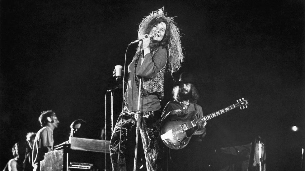 Janis Joplin and her final group, the Full Tilt Boogie Band, perform at the Festival for Peace at Shea Stadium.