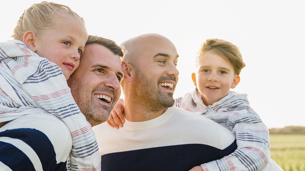 LGBTQ family two dads happy kids