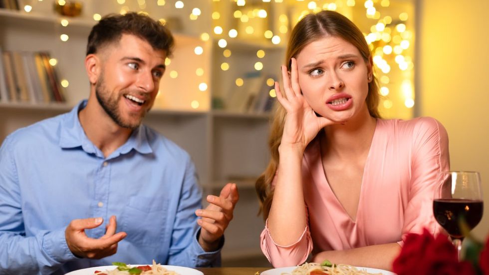 Man and woman having dinner