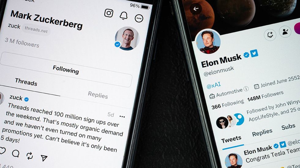 Mark Zuckerberg threads Elon Musk Twitter social media accounts showing on cell phones