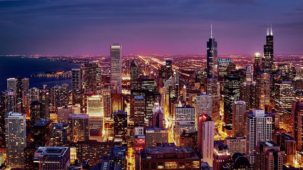 night sunset city skyline chicago and suburbs beyond