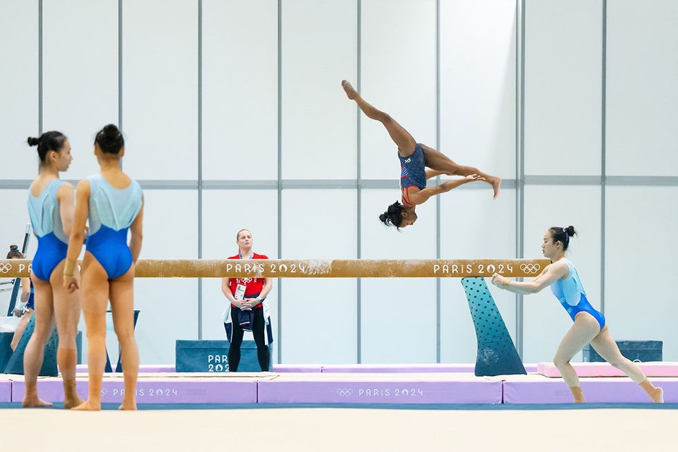 Olympic gymnastics, Simone Biles, Team USA, balance beam training, gymnasts watch the Paris 2024 Games