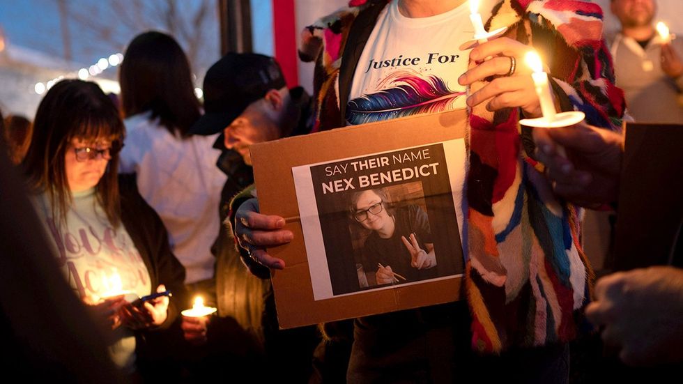 People attend a candlelight vigil for 16-year-old nonbinary student Nex Benedict on February 24, 2024 in Oklahoma City Benedict died one day after a physical altercation in an Owasso High School girls bathroom