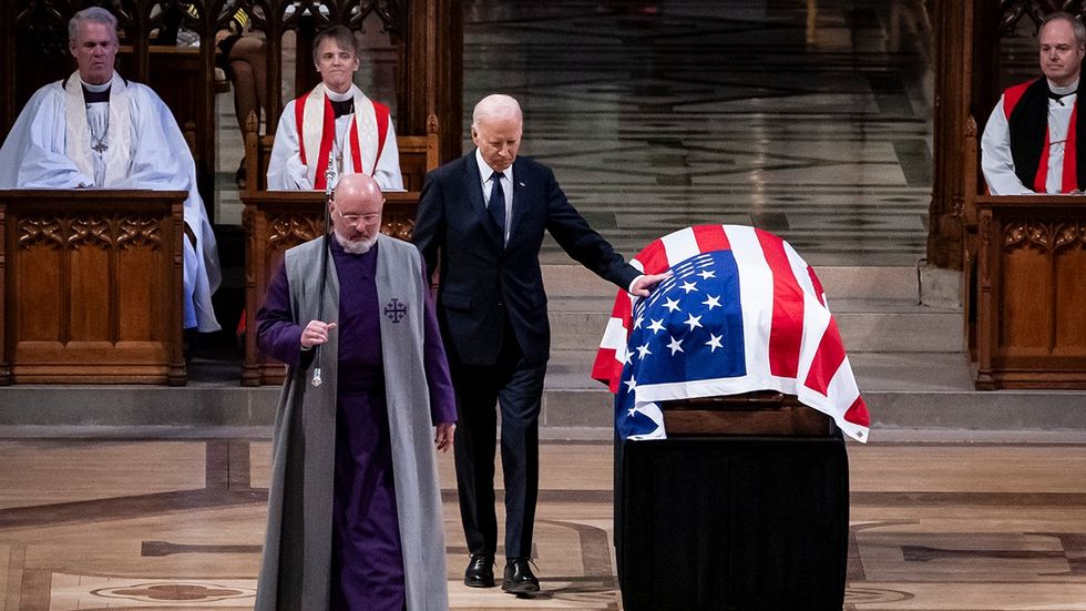 President Biden touches casket at Jimmy Carter's funeral