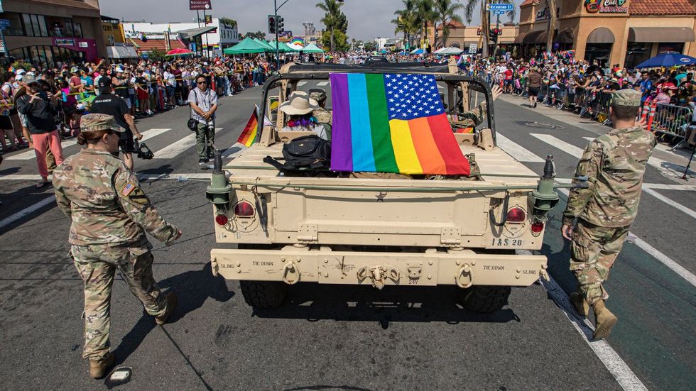 rainbow stripes american flag military participants LGBTQ pride parade 2022 San Diego california