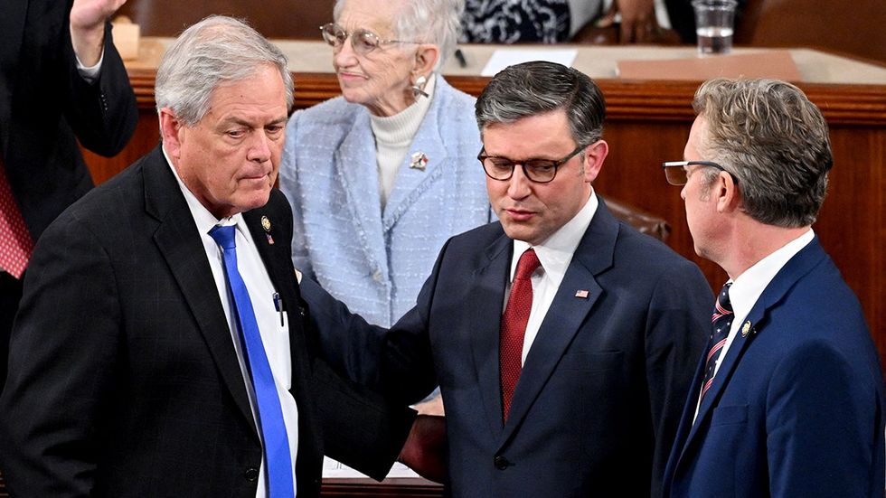 Representative Ralph Norman Republican South Carolina Speaker of the House Mike Johnson Republican Louisiana Representative Andy Ogles Republican Kentucky during vote for Speaker of the House first day of the 119th Congress US Capitol Washington DC USA