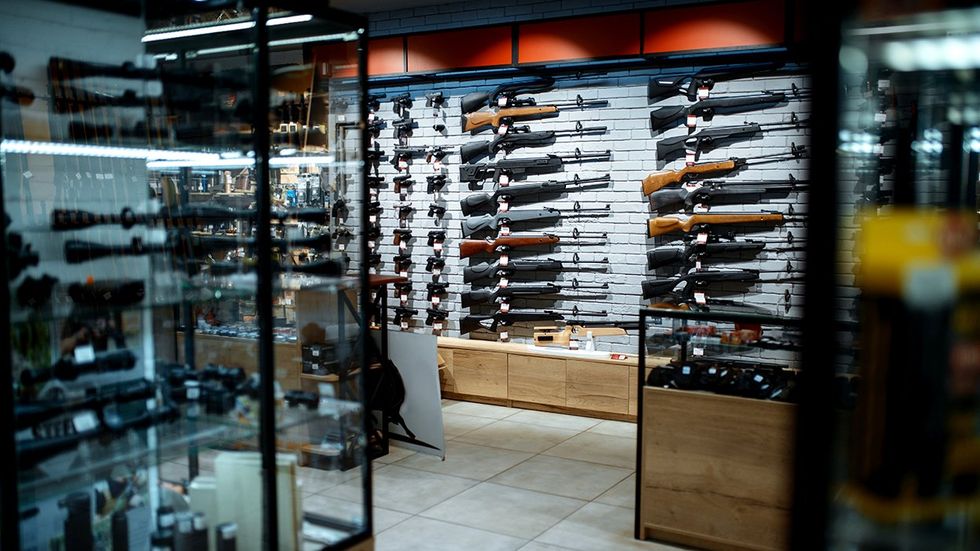 rifles gun store racks display cases