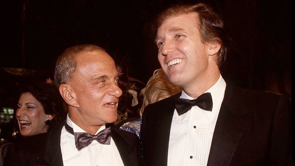 Roy Cohn and Donald Trump attend the Trump Tower opening October 1983 New York City