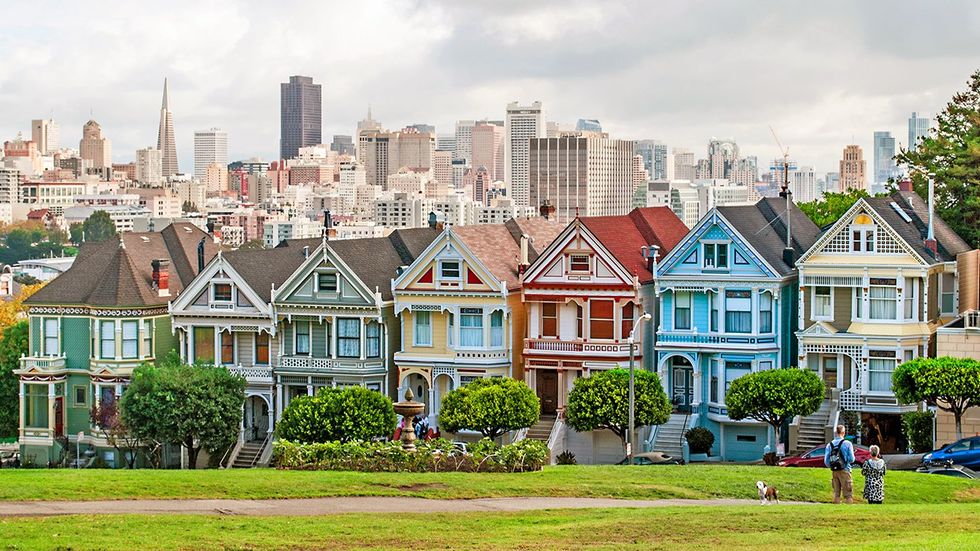 San Francisco Hayes Valley Painted Ladies houses city skyline background