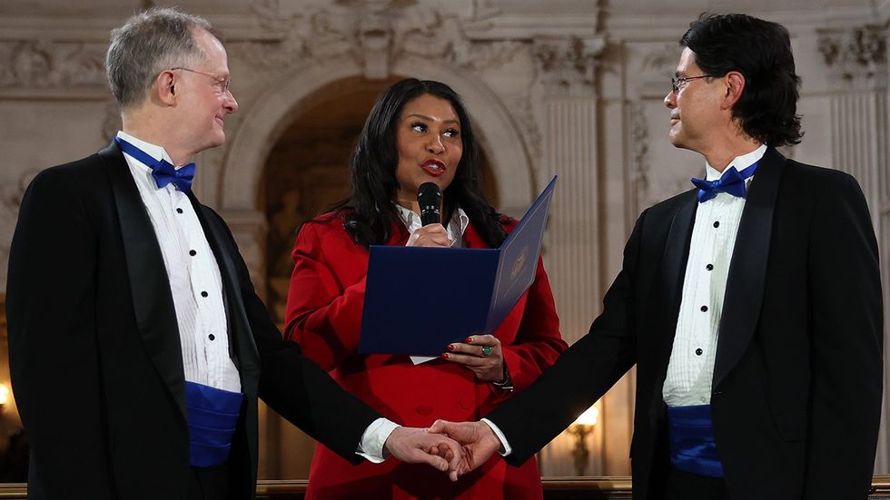 San Francisco Mayor London Breed renews the vows of same sex couple John Lewis Stuart Gafney 2024 ceremony at City Hall