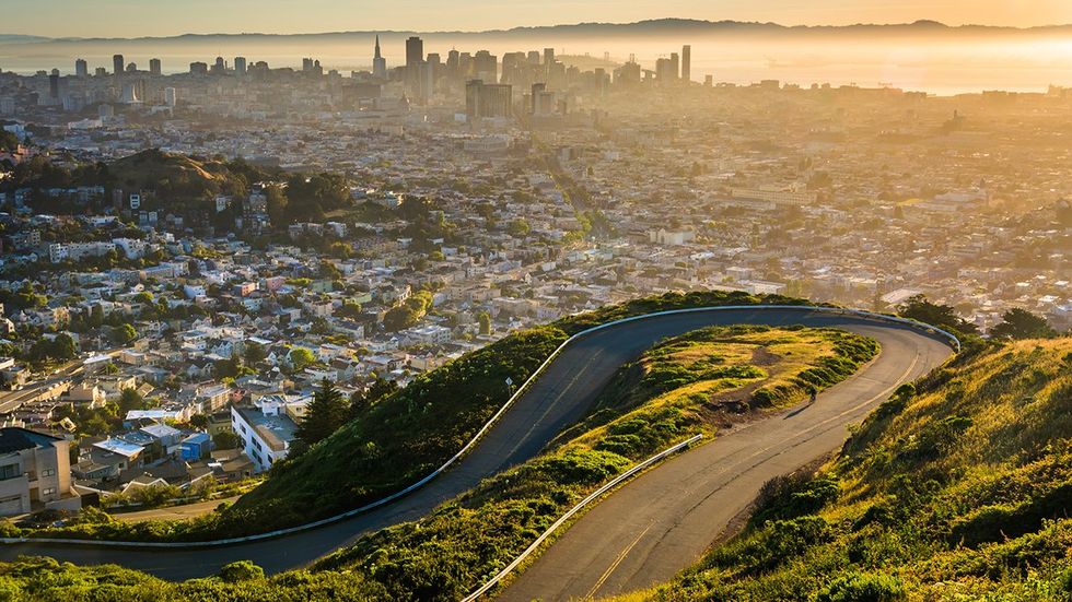 san francisco skyline and market street photographed from twin peaks winding road neighborhood