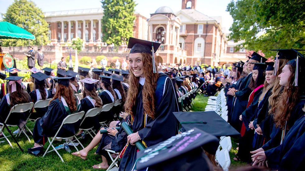 Seniors celebrate after receiving their diplomas during what was thought to be the final commencement ceremony at Sweet Briar College womens liberal arts college VA 2015