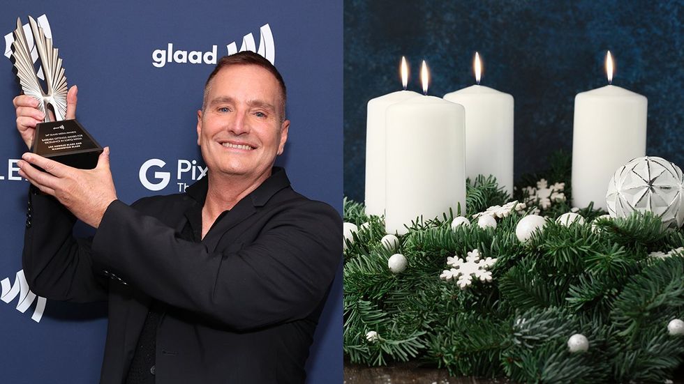 Troy Masters holding glaad media award 2023 white candles holiday wreath