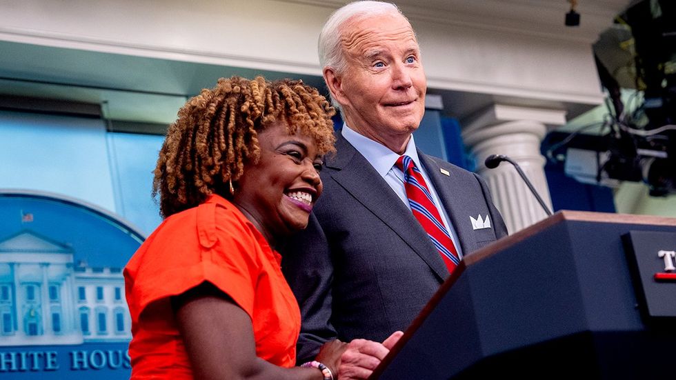 White House press secretary Karine Jean Pierre US President Joe Biden making jokes during a news conference in the Brady Press Briefing Room White House October 2024 Washington DC