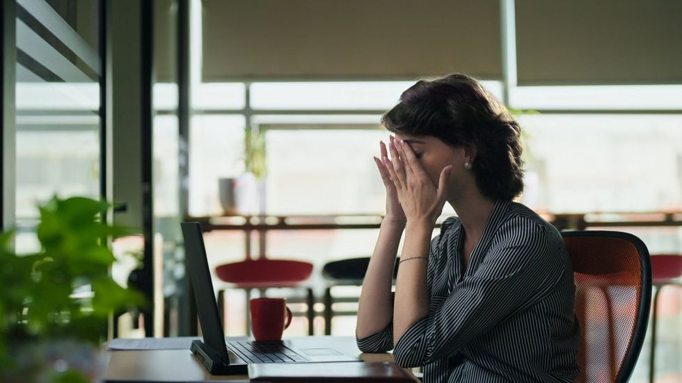 woman upset at her computer