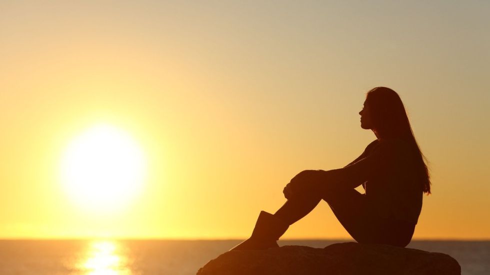 women's watching the sunset