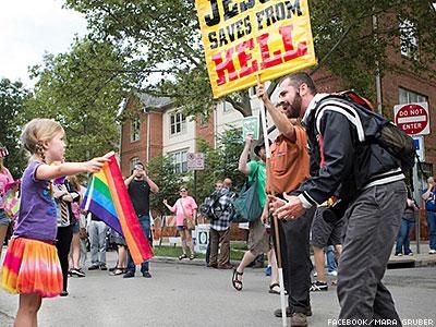 WATCH: 7-Year-Old Waves Pride Flag in Face of Homophobic Rant, Wins ...