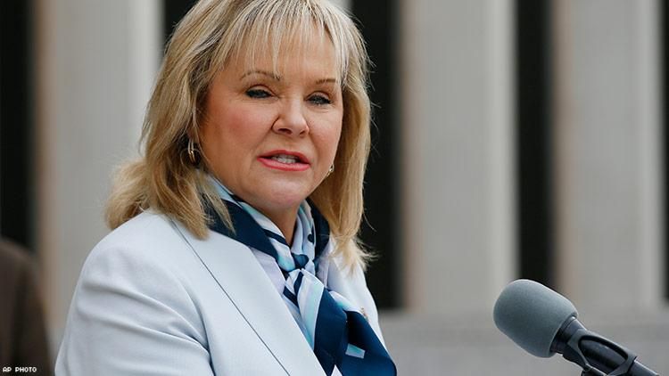 Oklahoma governor vetoes gun carry bill in defeat for NRA