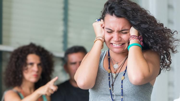 Teenager with angry parents