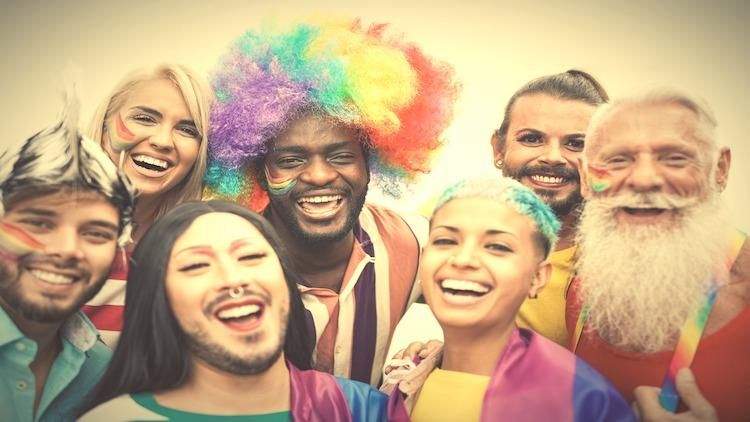 group of intergenerational multicultural people with rainbow colors