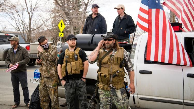 Men armed at protest