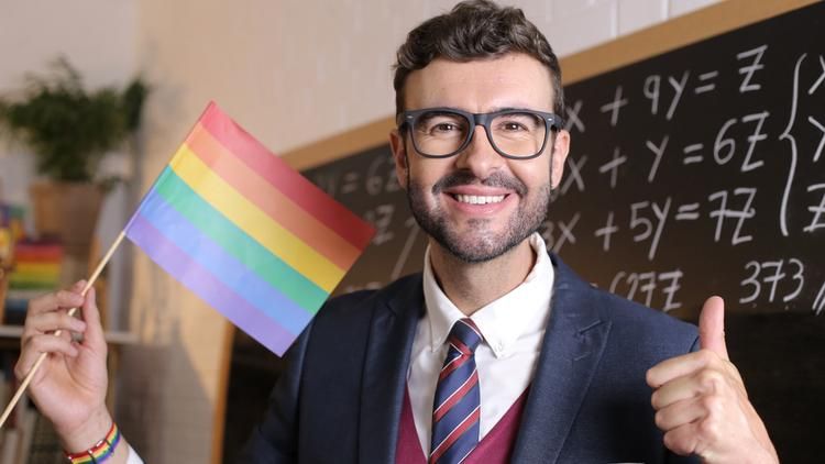 Teacher with pride flag